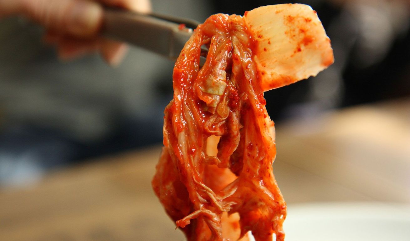 Delicious YesYum kimchi on tongs
