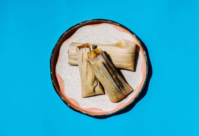 A plate of pork and kimchi tamales